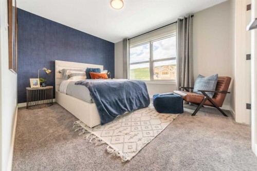 199 Langwell Common Se, Airdrie, AB - Indoor Photo Showing Bedroom