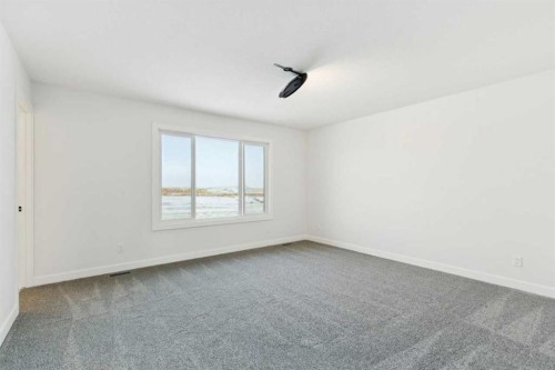 199 Langwell Common Se, Airdrie, AB - Indoor Photo Showing Other Room