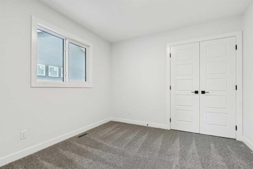 199 Langwell Common Se, Airdrie, AB - Indoor Photo Showing Other Room