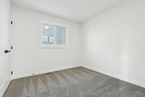 199 Langwell Common Se, Airdrie, AB - Indoor Photo Showing Other Room