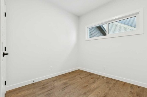 199 Langwell Common Se, Airdrie, AB - Indoor Photo Showing Other Room