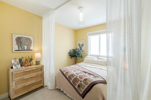 58 Drystone Way Nw, Calgary, AB - Indoor Photo Showing Bedroom