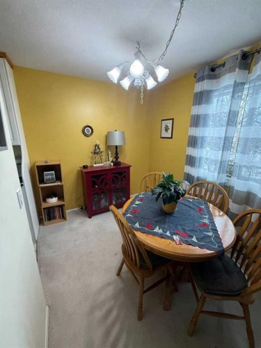 201-5519 Kerry Wood Drive, Red Deer, AB - Indoor Photo Showing Dining Room