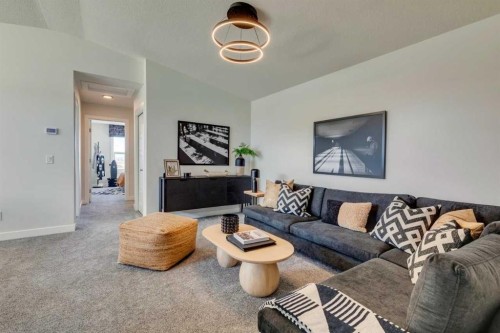 12 Aster Link, Okotoks, AB - Indoor Photo Showing Living Room