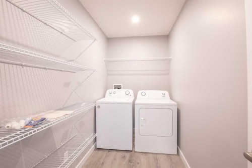 109 Aztec Crescent, Blackfalds, AB - Indoor Photo Showing Laundry Room