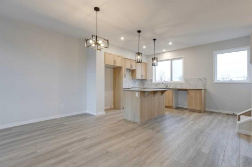 101-81 Midtown Boulevard Sw, Airdrie, AB - Indoor Photo Showing Kitchen