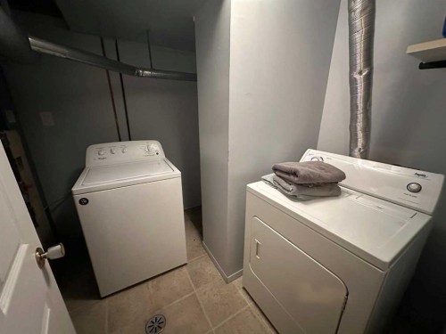 A & B-4923 53 Street, Rocky Mountain House, AB - Indoor Photo Showing Laundry Room