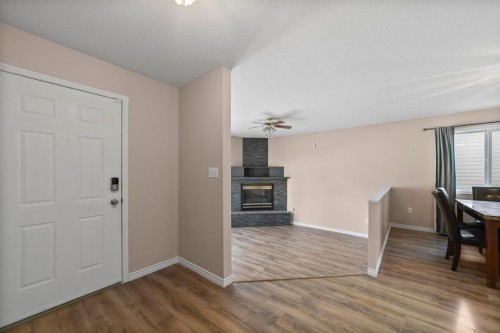5220 47 Street, Camrose, AB - Indoor With Fireplace