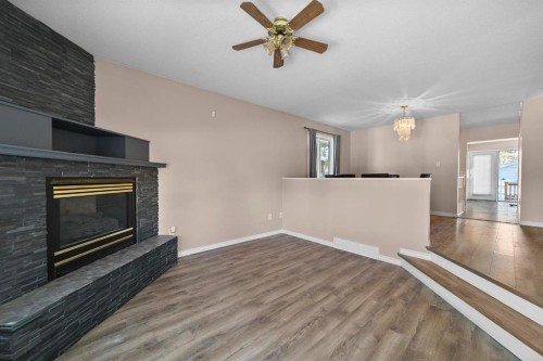 5220 47 Street, Camrose, AB - Indoor With Fireplace