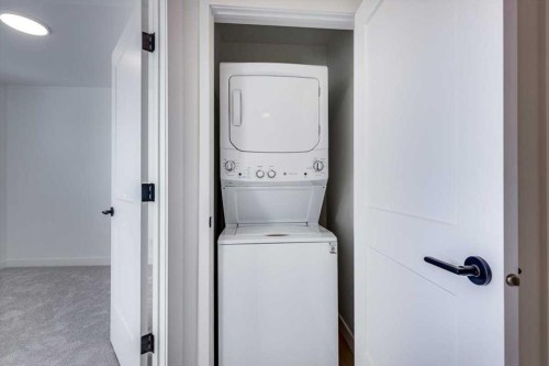 42 Irvin Way, Sylvan Lake, AB - Indoor Photo Showing Laundry Room