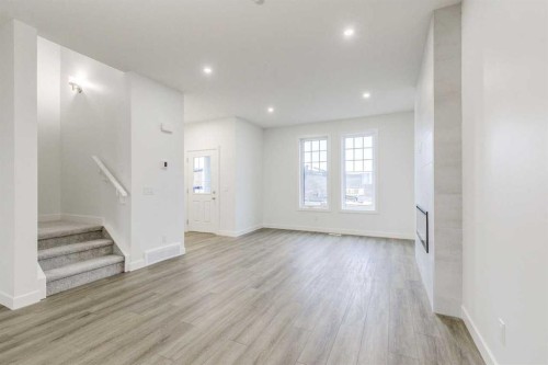 221 Bridgeport Gate Sw, Chestermere, AB - Indoor Photo Showing Other Room