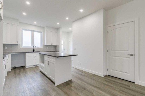 221 Bridgeport Gate Sw, Chestermere, AB - Indoor Photo Showing Kitchen