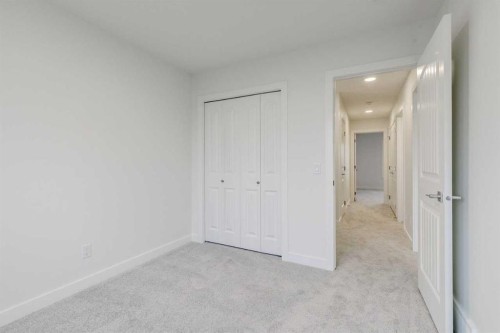 221 Bridgeport Gate Sw, Chestermere, AB - Indoor Photo Showing Other Room
