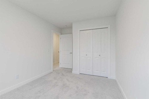 221 Bridgeport Gate Sw, Chestermere, AB - Indoor Photo Showing Other Room