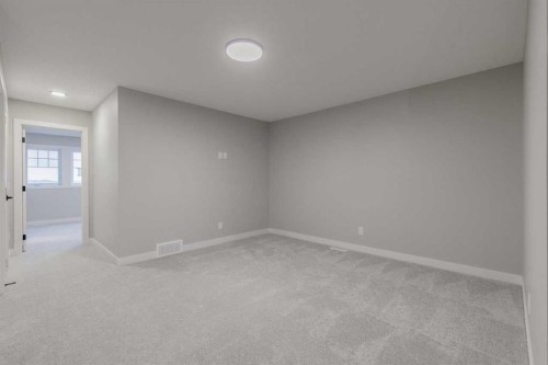 197 Bridgeport Gate, Chestermere, AB - Indoor Photo Showing Other Room