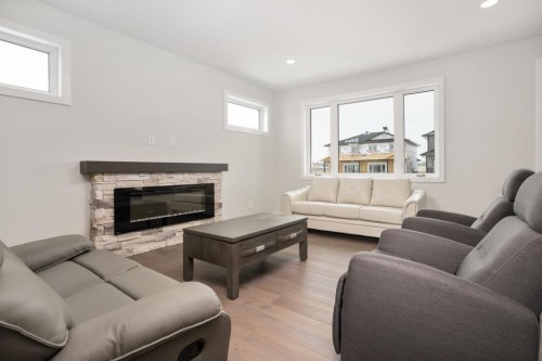 6319 26 Avenue, Camrose, AB - Indoor Photo Showing Living Room With Fireplace