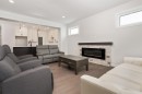 6319 26 Avenue, Camrose, AB  - Indoor Photo Showing Living Room With Fireplace 