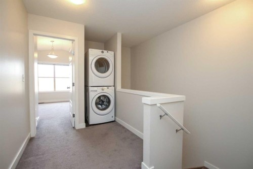 404-125 Caribou Crescent, Red Deer, AB - Indoor Photo Showing Laundry Room