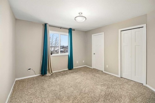1-5301 Windward Place, Sylvan Lake, AB - Indoor Photo Showing Other Room