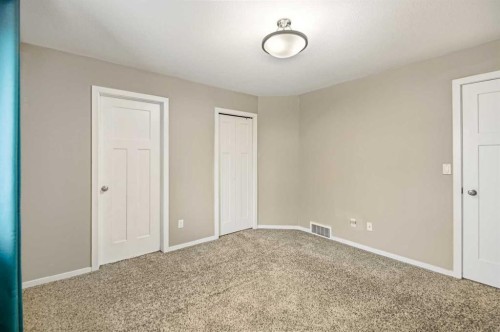 1-5301 Windward Place, Sylvan Lake, AB - Indoor Photo Showing Other Room