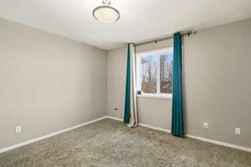 1-5301 Windward Place, Sylvan Lake, AB - Indoor Photo Showing Other Room