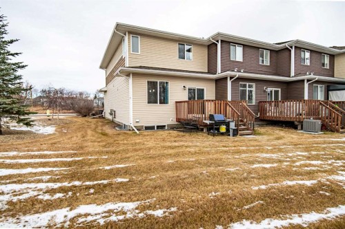 1-5301 Windward Place, Sylvan Lake, AB - Outdoor With Deck Patio Veranda