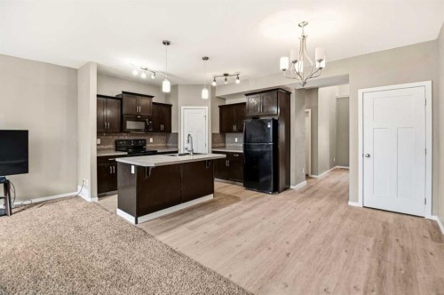 1-5301 Windward Place, Sylvan Lake, AB - Indoor Photo Showing Kitchen