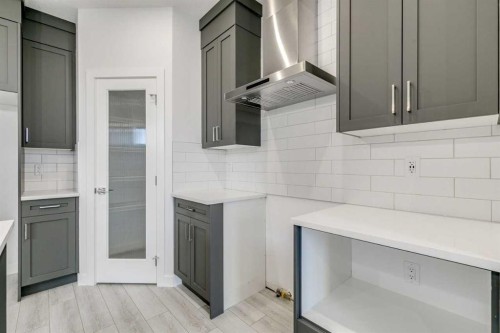 205 Bridgeport Gate, Chestermere, AB - Indoor Photo Showing Kitchen