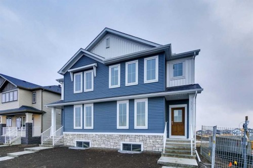 205 Bridgeport Gate, Chestermere, AB - Outdoor With Facade