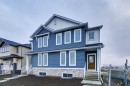 205 Bridgeport Gate, Chestermere, AB  - Outdoor With Facade 