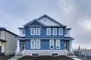 205 Bridgeport Gate, Chestermere, AB  - Outdoor With Facade 