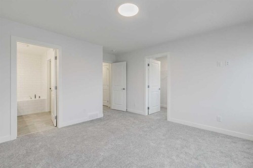 205 Bridgeport Gate, Chestermere, AB - Indoor Photo Showing Other Room