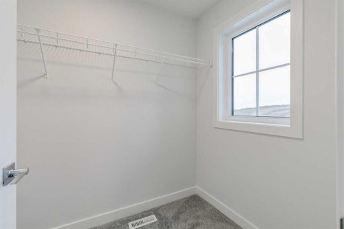 205 Bridgeport Gate, Chestermere, AB - Indoor With Storage