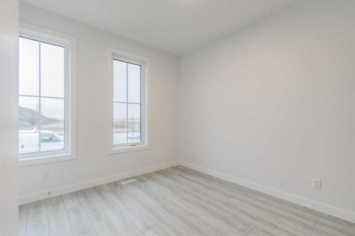 205 Bridgeport Gate, Chestermere, AB - Indoor Photo Showing Other Room