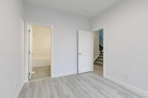 205 Bridgeport Gate, Chestermere, AB - Indoor Photo Showing Other Room