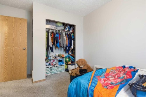 598-100 Jordan Parkway, Red Deer, AB - Indoor Photo Showing Bedroom