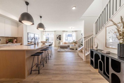 136 Versant Point Sw, Calgary, AB - Indoor Photo Showing Kitchen With Upgraded Kitchen