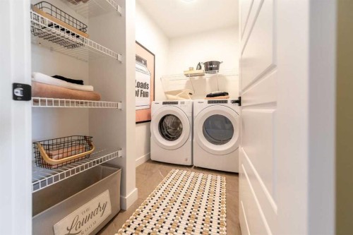 136 Versant Point Sw, Calgary, AB - Indoor Photo Showing Laundry Room