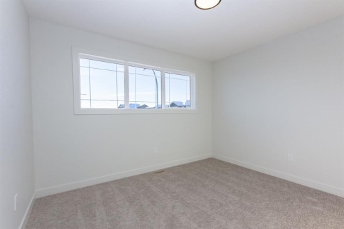 260 Augustus Way, Penhold, AB - Indoor Photo Showing Other Room
