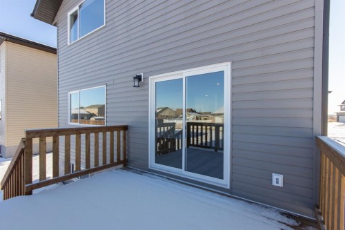 260 Augustus Way, Penhold, AB - Outdoor With Deck Patio Veranda With Exterior