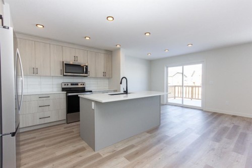 260 Augustus Way, Penhold, AB - Indoor Photo Showing Kitchen With Stainless Steel Kitchen With Upgraded Kitchen