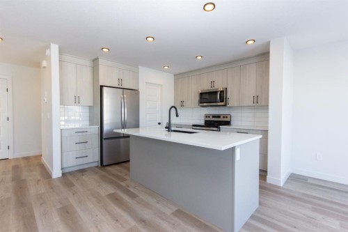 260 Augustus Way, Penhold, AB - Indoor Photo Showing Kitchen With Stainless Steel Kitchen With Upgraded Kitchen