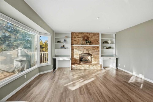 30 Comfort Close, Red Deer, AB - Indoor Photo Showing Living Room With Fireplace