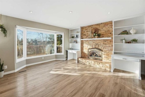 30 Comfort Close, Red Deer, AB - Indoor Photo Showing Living Room With Fireplace