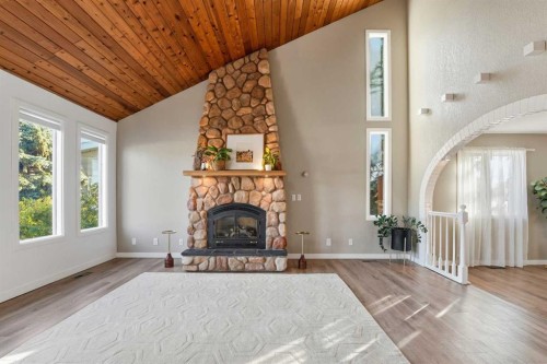 30 Comfort Close, Red Deer, AB - Indoor Photo Showing Living Room With Fireplace