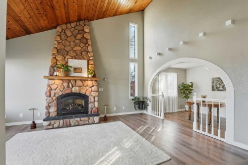 30 Comfort Close, Red Deer, AB - Indoor Photo Showing Living Room With Fireplace