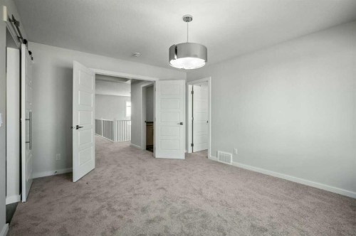 18 Heartwood Villas Se, Calgary, AB - Indoor Photo Showing Other Room