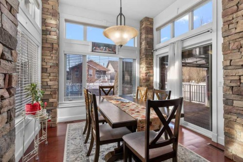 20 Oakfield Close, Red Deer, AB - Indoor Photo Showing Dining Room With Fireplace