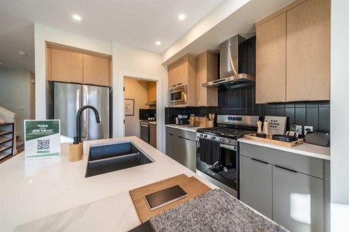 448 Lewiston Landing Ne, Calgary, AB - Indoor Photo Showing Kitchen With Stainless Steel Kitchen With Double Sink With Upgraded Kitchen