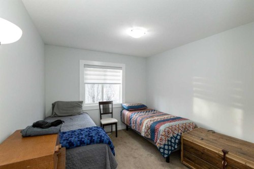 5032 47 Street, Sylvan Lake, AB - Indoor Photo Showing Bedroom